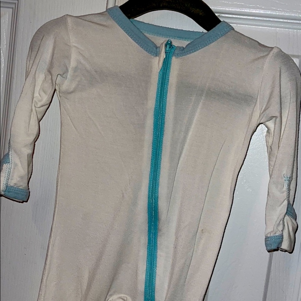 Kickee pants white onesie with blue zipper/seam